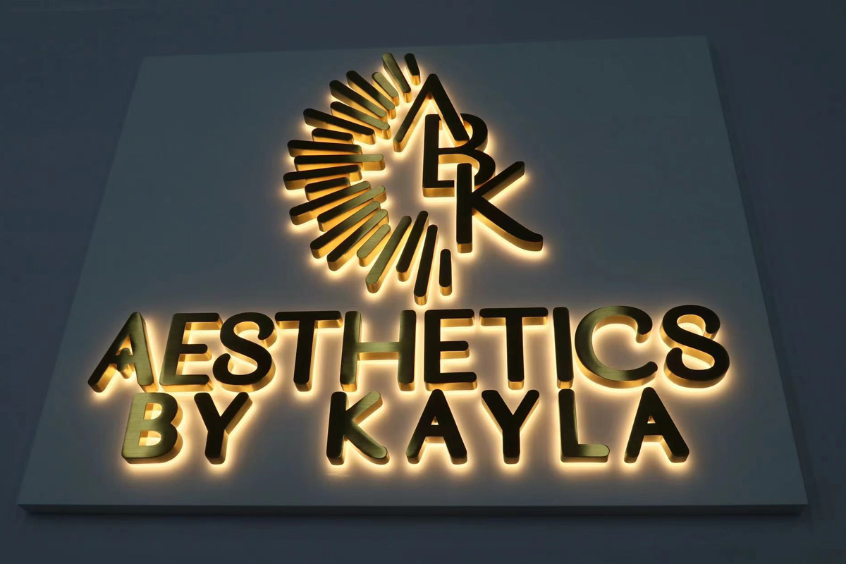 Backlit Channel letter signs & Gold Logo on Metal Plate