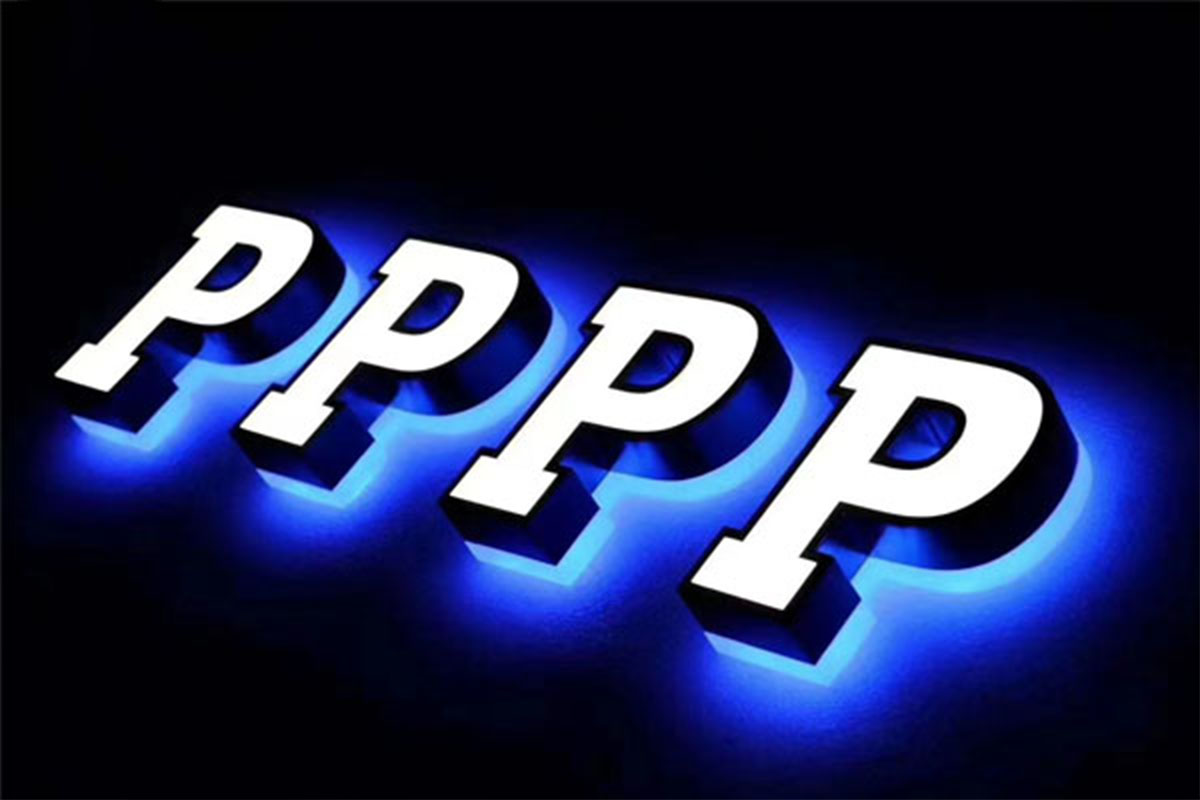 Close-up of vibrant luminous letters with neon effect